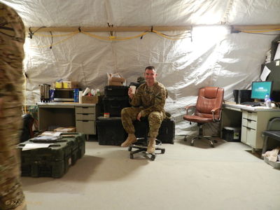 CW2 Chris Dayberry sitting in the CP enjoying some coffee.
Mike Caudle Photo
