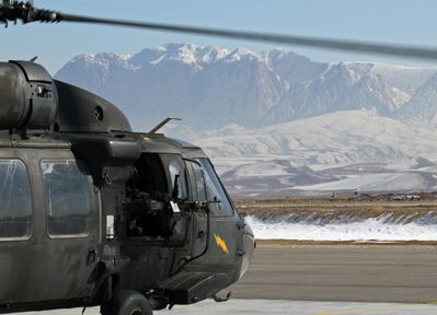 CAMP MARMAL, Afghanistan
A crew chief assigned to Company A, Task Force Lobos, 1st Air Cavalry Brigade, 1st Cavalry Division looks on as a UH-60 Black Hawk helicopter prepares to take off for a mission Feb. 7, here. The 1st Air Cavalry Brigade began its mission in Afghanistan last June and is conducting aviation operations across four regional commands, providing ground forces with medevac support, air assault capabilities and overhead reconnaissance with air weapons teams. 

(U.S. Army photo by Staff Sgt. Joe Armas, 1st ACB, 1st Cav. Div. Public Affairs)
