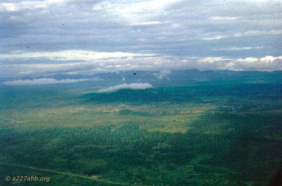 Looking west at Camp Radcliff
John Keller Photo

Heading west to Camp Radcliff, April 2, 1967. A cloud caps Hon Kong Mountain.

