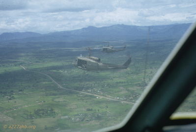 A/227 formation flight
John Keller Photo

'A/227 formation flight west of An Khe to Mang Yang Pass, January 1967.
