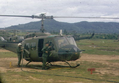 #62-12355 and CE Strubbe
John Keller Photo

June, 1966 with SP4/CE Richard Strubbe at pilot door refueling, Person at fuel nozzle is â€œunknownâ€

