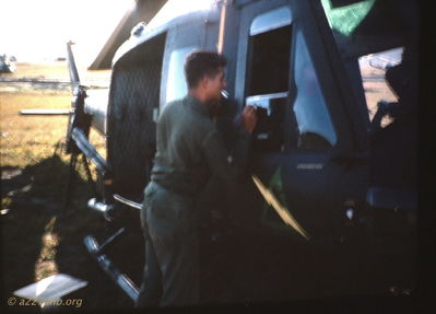 Frank Spady Sprucing up Huey
Robert Keller Photo

An Khe 1965 - 1966
