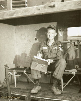 Russell Parker
Russell Parker Photo

Door Gunner Russell Parker - working on log book 

