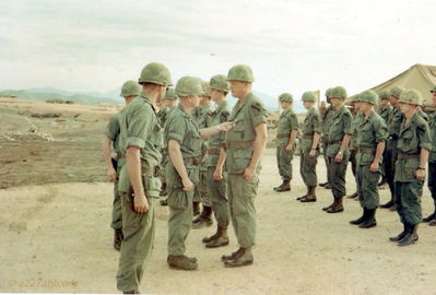 Award Presentation
Bob Witt Photo

Our 6, Major Littlewood and General Tolson (1CAV 6) pinning medal onto "Big Pete" our operations SGT. Pete had already been there for three tours in a row.

