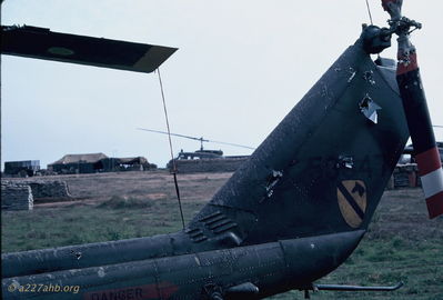 More damage from same rocket hit.
Bob Kelly Photo

D/227. Camp Evans. We fix 'em and fly 'em.
