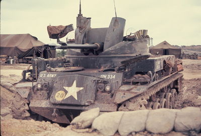 Perimeter defense
Bob Kelly Photo

D/227. Camp Evans. Can someone ID this vechicle.
Probably a  M42A1 Duster Light Tank
