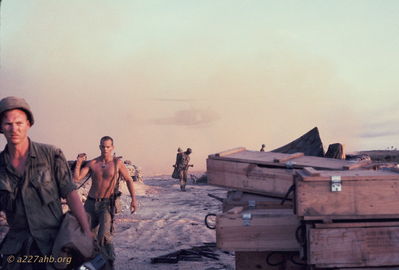 "Stunned" GI's
Bob Kelly Photo

D/227. Camp Evans.


