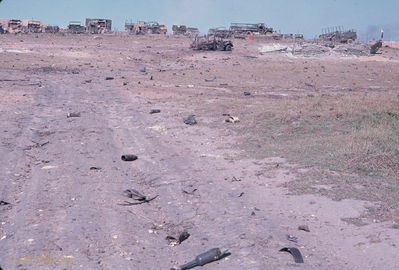 Some ammo dump remains
Bob Kelly Photo

Some live ammo from the ammo dump explosion. Burned vechicles and hueys.
