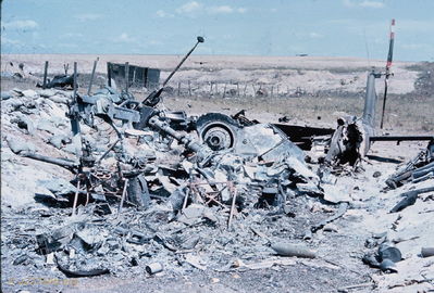 Huey destroyed by fire
Bob Kelly Photo

Tail boom on right, engine in center
