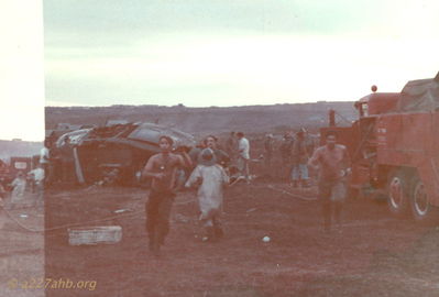 Rescue workers 083 crash
Ed Barry Photo

I was in A/227 from June of 71 until I was evac'd from the crash of 083
in Feb. 72.


