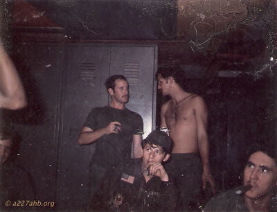 Crash and Ozark
Terry Moore Photo

Standing left to right: Dennis Moore (Crash) and Terry Moore (Ozark)
Some shots of the going home party for Crash held in the first flight platoon hooch Camp Holloway June or July 1971.


