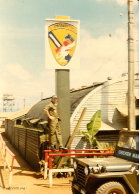 3rd Aviation Company Sign at Camp Holloway
Gene Champe Photo

Gene commanded the company after the death of Major Adams and saw the transition from A/227 to the 3rd Aviation Company in September 1971.  He points out the "Chickenman" patch as well as the name on the jeep.
