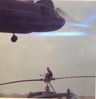 Preparing to hook 806 -  Shot down 16 Jan 1968 (not positive about the date) 
Steve Chrisman Photo

This is when we were shot down and had to be sling loaded out of the jungle.  
