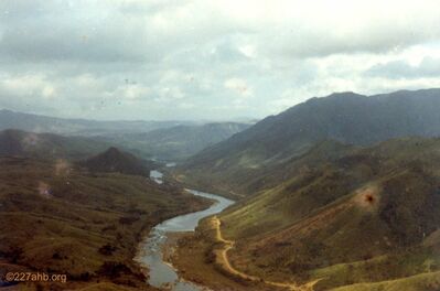 Highway 9 from LZ Stud (later nenamed LZ Vandergriff) to Khe Sanh,  Ske Sanh is the flat top mountain in the center
Dan Nichols Photo
Provided by his family
