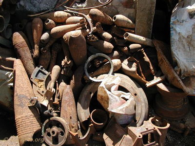 Closeup of Scrap Yard at Khe Sanh City
Doc McBride Photo

Modern Day Khe Sanh

From Bob Witt. "Doc Mcbride, Mike Sprayberry's medic at LZ Tiger, took these pictures on his return trip to Vietnam. He returned the A Shau to look for his unit's MIA's lost at Tiger. Doc fortunately survived serious wounds received on the road below Tiger on April 25, 1968. Mike Sprayberry received the MOH for going out that night to rescue Doc & the rest of his patrol. Their unit was on board for the first Combat Assault's into LZ Tiger."

