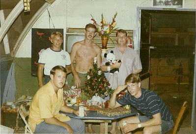 Dorm at Christmas
Mike Jett Photo

Christmas 1970 RVN
seated, Bill Cornell, Dooler Booth
standing, Jeff Findley, Mike Jett, Bill Baily

