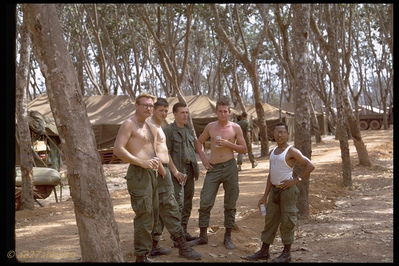 Lai Khe Motor Pool Crew
Jim Brodie Photo

Lai Khe
Motor pool bunch 

