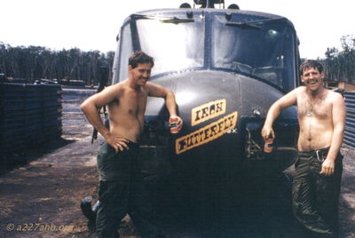 Unknowns with "Iron Butterfly"
http://www.vietnam.ttu.edu/virtualarchive/

Photo from the Maury William Hearne collection in the Virtual Vietnam Archive at Texas Tech University

From Ed Sanford:  "The last name of the guy on the right is Harkness."

Jim Lietzan, Crew Chief, identified on the left by Jeff Harkness

Keywords: nose art
