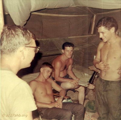 Group in tent
David Priest Photo

Lai Khe 1969
Can anyone help with first names or home towns?
Please send that information to the web site or contact David Priest or Joe Leonard by email.

