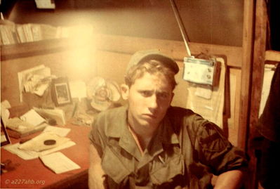 Mike Scovel takes a moment
David Priest Photo

Lai Khe 1969
Can anyone help with first names or home towns?
Please send that information to the web site or contact David Priest or Joe Leonard by email.


