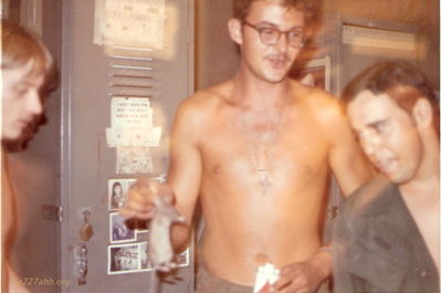 Rat killing in Lai Khe
Terry Moore Photo


Rat killing in Lai Khe. Note the lighter fluid being held by Ozark Joe (Terry Moore). We would soak the rat/mouse with fluid but not set him on fire. We would make a six foot circle with lighter fluid and light it then drop the rat/mouse in the center. He had a choice, though all chose to run, bad mistake.

