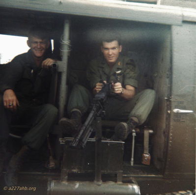 WO Neal Heape (left) and 1LT David Dewey (right)
Gordon Lewis Photo

WO Neal Heape and 1LT David Dewey, (The pilot behind the machine gun has been identified as 1LT David Dewey by Steve Davidson. ) at LZ Betty, Phan Thiet, November 1967
A/227 Aircraft
