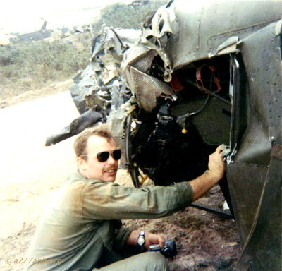 Hoyte
Rickey McKay photo

D/227
Mr. Hoyte taking pictures of crashed helicopter he was KIA not long after this crash.No one was hurt in this crash amazingly 
