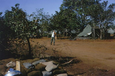 WO1 William Robertson
John Keller Photo

LZ Oasis, December 1966, WO1 William Robertson tossing the baseball.
