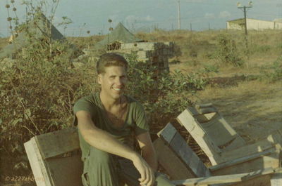 "Deros Tan"
John Keller Photo

WO-1 John Keller on "alert" but still time for "Deros Tan"! Late March 1967 at Phan Thiet
