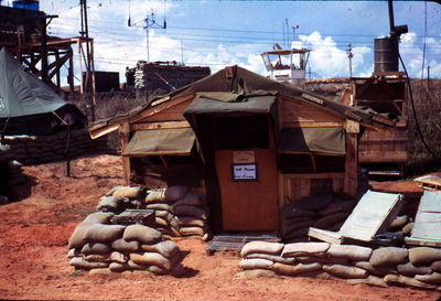 Prime Living Quarters
Jim Puhala Photo

Phan Thiet
The gun platoon pilots lived in a GM Medium tent â€“ pretty roomy quarters for a small number of occupants. Before I joined the platoon, somebody constructed this hootch. At the time this picture was taken it was occupied by 2 short-timer WOâ€™s. Later, Platoon Leader CPT Jack Watkins moved in. When he left, I moved in.

