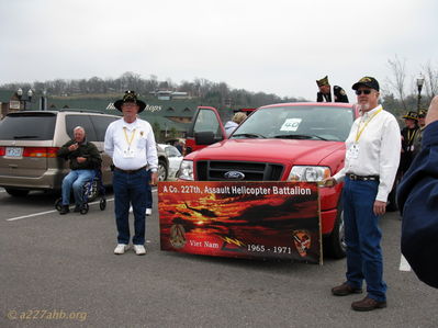 Reunion banner at the parade
Lillian Burbank Photo

Left to right:
Mike Schlaudraff, Jim Cooper
