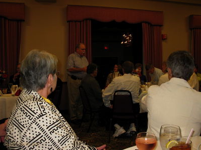 Farewell Dinner
Lillian Burbank Photo

Tom Johnson making an announcement at the Farewell Dinner 11/11/09

