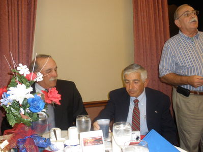 Farewell Dinner
Bob Kelly Photo

Left to Right:
John (PePe) LaDue, Marshall Ferris and Tom Johnson (Standing)
