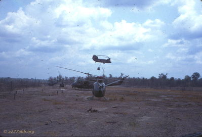 Location unknown. Chinook with load, hueys, and ?? 
Wayne Trucke Photo

1969
