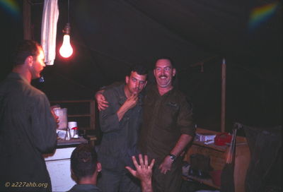Cpt. Pete Barber hugging WO1 Gerry Ventrella 
Wayne Trucke Photo

Individuals identified by Allen Russell
