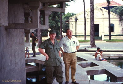 A number of us who went to flight school together and arrived in Vietnam together were able to arrange a mini R&R in Saigon. 
Wayne Trucke Photo

 Trotter and unknown in Saigon - 1969 

