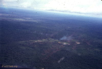 Bomb craters in field that may have been used for a combat assault 
Wayne Trucke Photo
