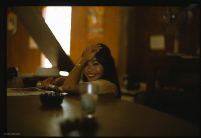Officer's Club bar maid at the bar. 
Wayne Trucke Photo

Lai Khe  1969
